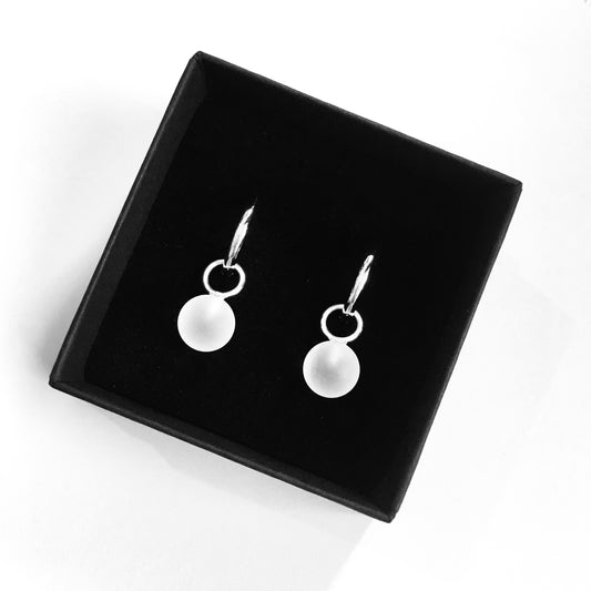 Lumen. Rock crystal pendants on silver earrings