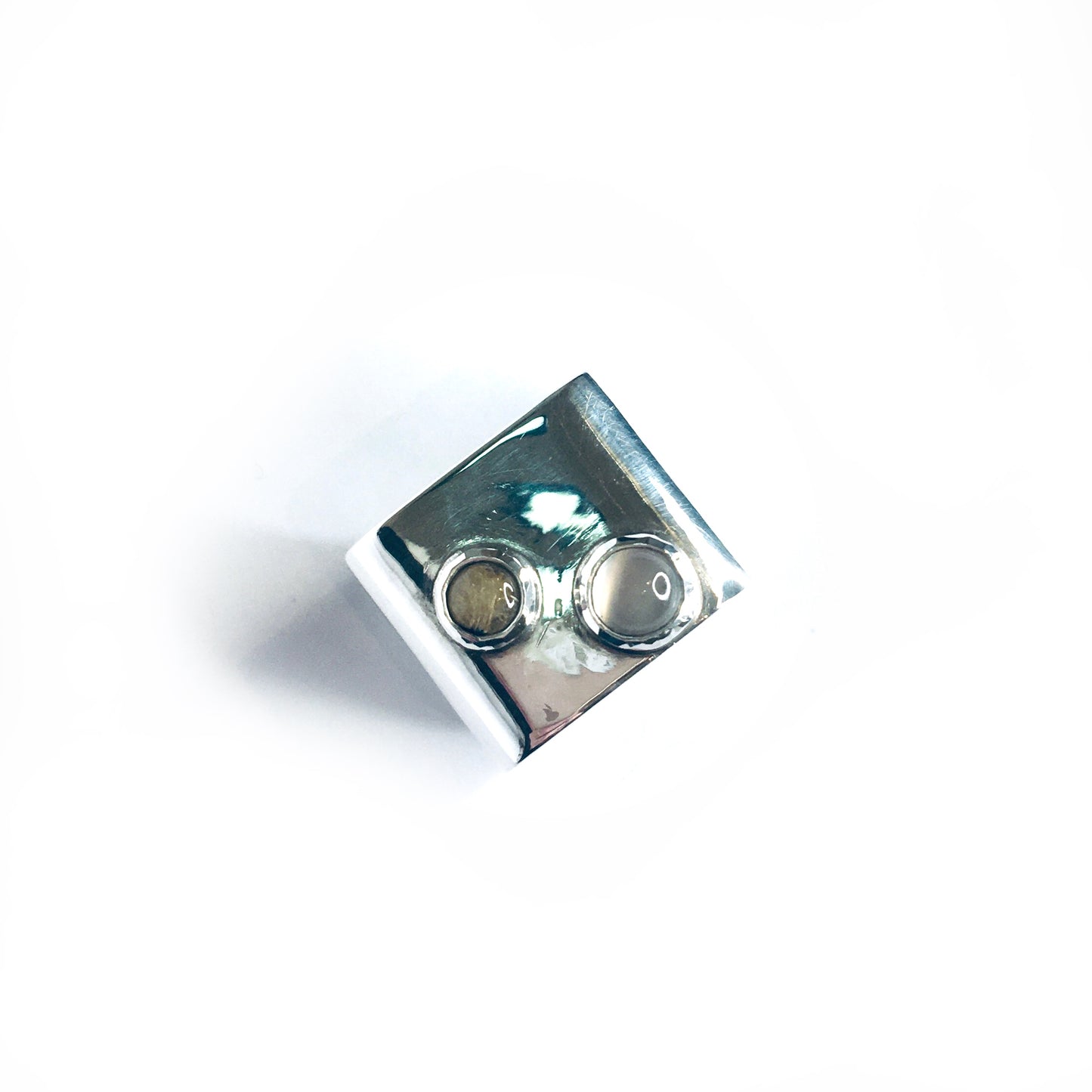 Marcel ring with rutile quartz and moonstone