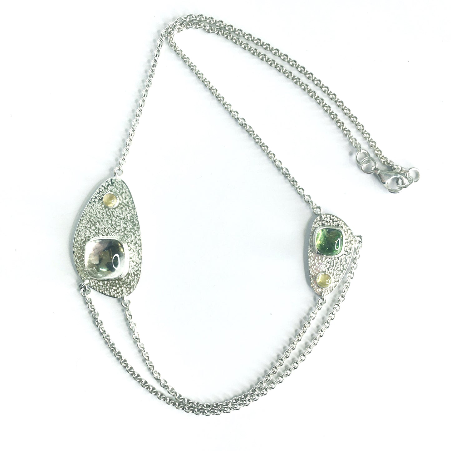 Silver necklace with corundum, peridot and rock crystal